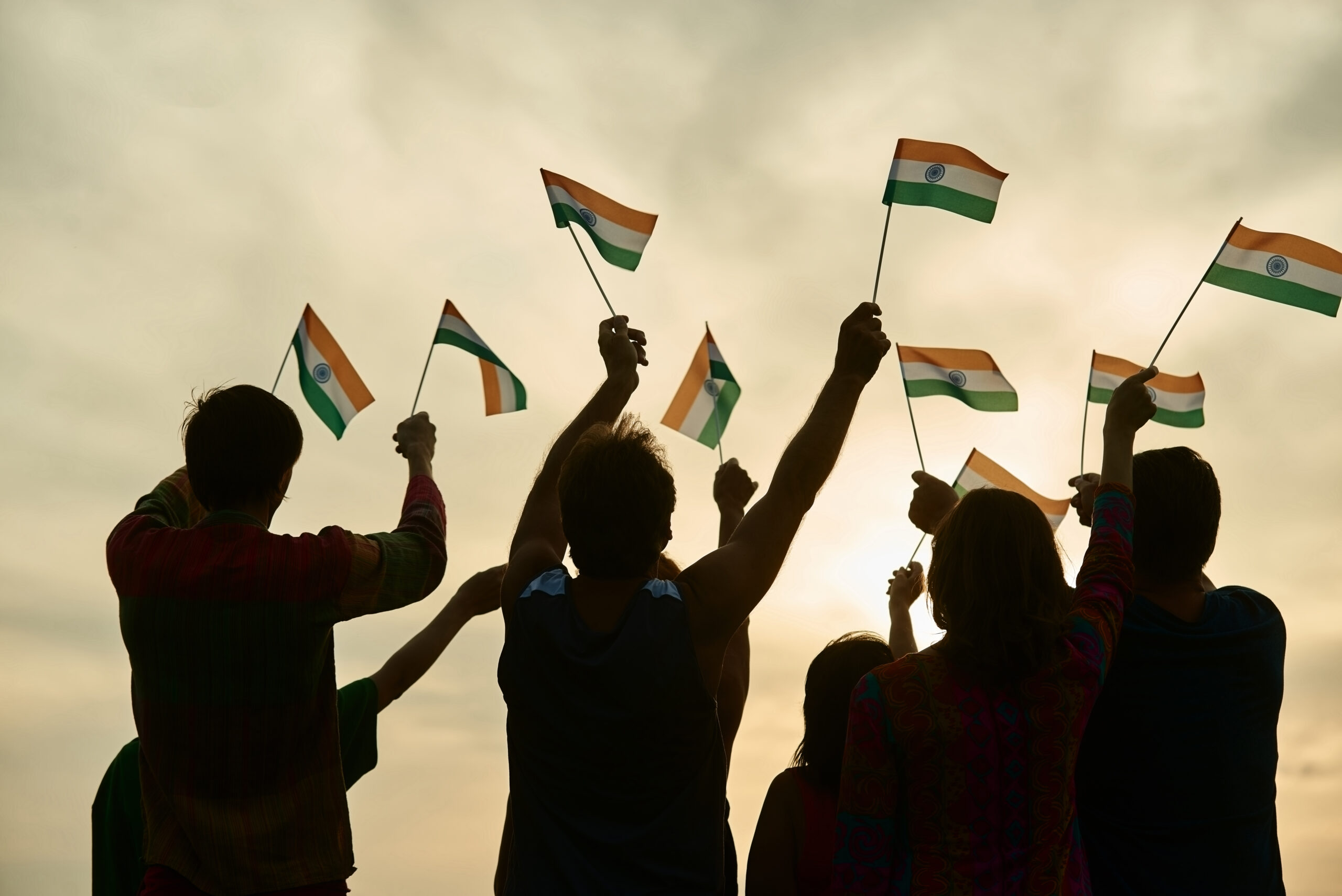 Indian patriots with flags outdoor.